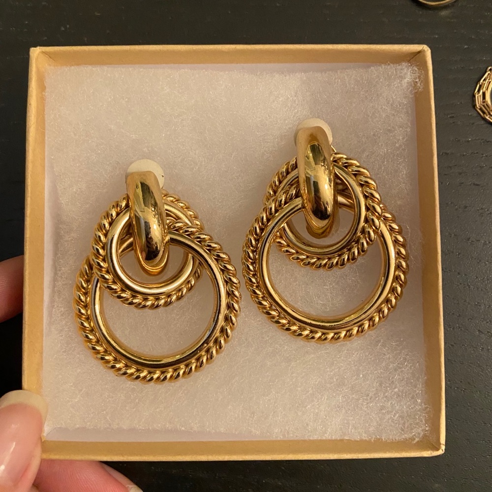 Givenchy gold tone statement earrings.
